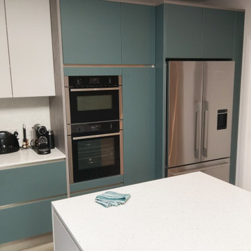 Sleek Kitchen Design in Headstone By  Kudos Interior Designs