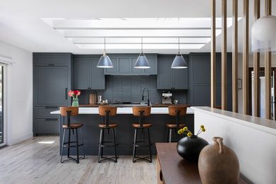 Example of a 1960s kitchen design in Denver