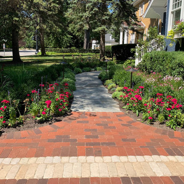 Flagstone walkway with clay paver apron