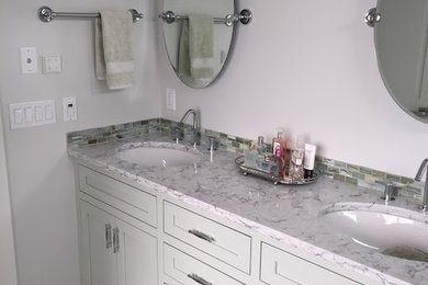 Mid-sized transitional master beige tile, gray tile and marble tile marble floor bathroom photo in Providence with beaded inset cabinets, white cabinets, beige walls, an undermount sink, marble countertops and gray countertops