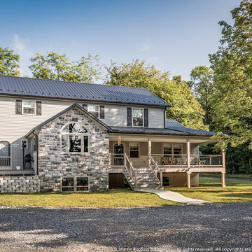Amish House with Textured Black Metal Roof