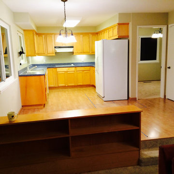 Original kitchen dominated by fridge