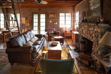 Inspiration for a rustic living room remodel in Other