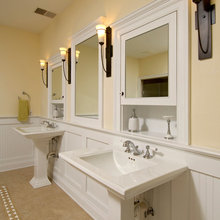 Wainscoting behind pedestal sink