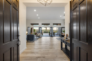 Example of a large transitional open concept family room design in Phoenix