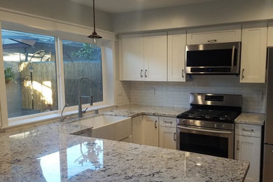 Farmhouse kitchen photo in Orange County
