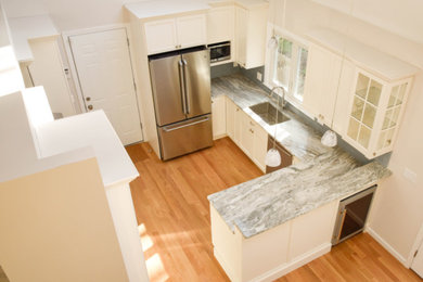 Example of a transitional kitchen design in Boston