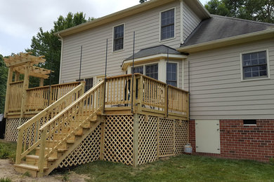 Photo of a transitional deck in Richmond.