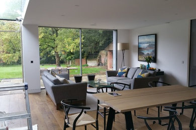 This is an example of a medium sized contemporary living room in Hampshire.