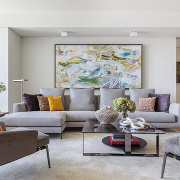 Colorful pillows give this living room a needed boost of color