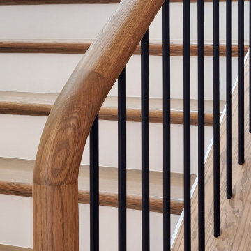 Project #153 | Sophisticated Red Oak Stair with Metal Balusters
