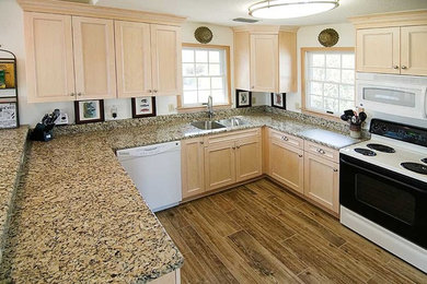 Example of a classic kitchen design in Other
