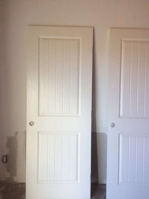 Wainscoting height issue with wood stove hearth / barn door style