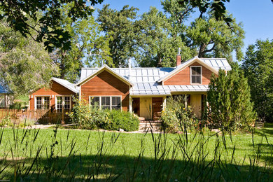 Inspiration for a cottage exterior home remodel in Denver