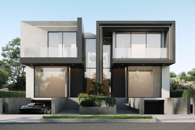 Modelo de fachada de casa bifamiliar contemporánea grande de dos plantas con tejado plano