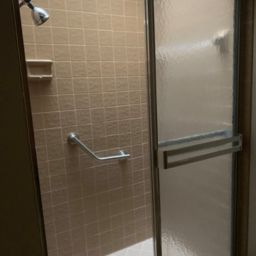 Before - Cramped shower with a skylight... ready to shine in the sun again!
