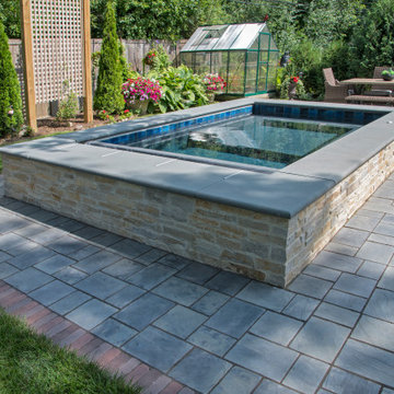 Evanston-A small rear patio that provides everything you can dream of and more.