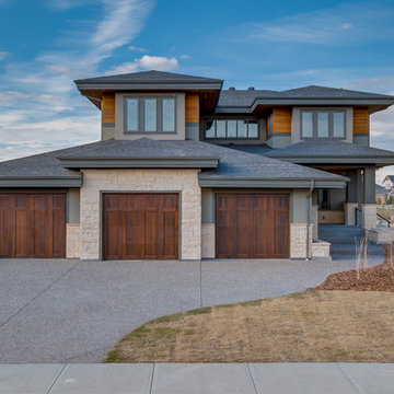 Custom 2 Storey Backing on to cascading ponds