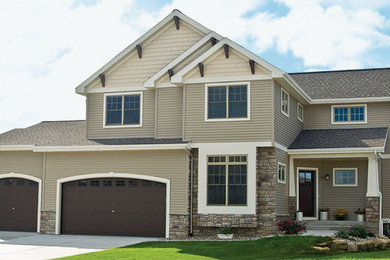 Mid-sized elegant beige two-story mixed siding exterior home photo in Orange County with a shingle roof