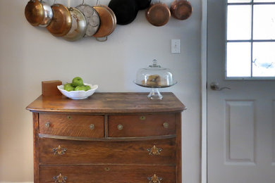 Kitchen - small transitional light wood floor kitchen idea in Other