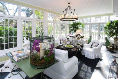 Inspiration for a large tropical ceramic tile sunroom remodel in Miami with a standard ceiling