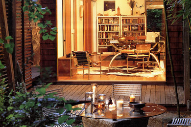 Example of a minimalist one-story wood exterior home design in Seattle
