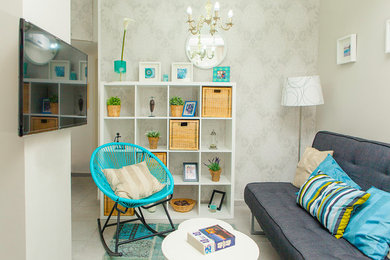 Example of a small beach style formal and open concept ceramic tile and beige floor living room design in Tel Aviv with beige walls, no fireplace and a wall-mounted tv