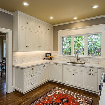 Kitchen with Honed Carrera and Subway Tile