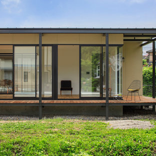 他の地域のインダストリアルスタイルのおしゃれなデッキ (張り出し屋根) の写真