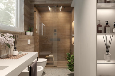 This is an example of a medium sized contemporary shower room bathroom in Other with beaded cabinets, grey cabinets, an alcove shower, a wall mounted toilet, brown tiles, wood-effect tiles, porcelain flooring, a trough sink, solid surface worktops, grey floors, a sliding door, grey worktops, a single sink, a floating vanity unit and wood walls.