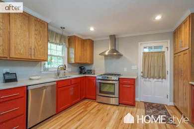 Example of a large transitional l-shaped light wood floor open concept kitchen design with an undermount sink, raised-panel cabinets, red cabinets, quartz countertops, stainless steel appliances and multicolored countertops