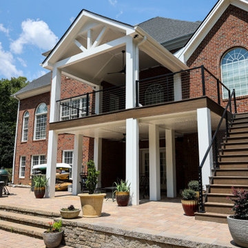 Two Story Covered Porch & Trex Deck with Trex Rain Escapes Underpinning