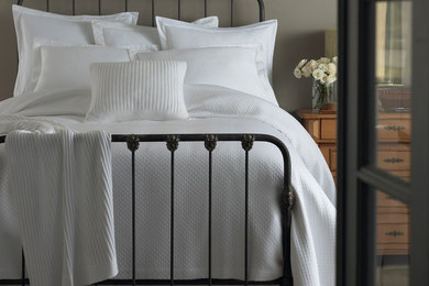 Bedroom - mid-sized traditional bedroom idea in Other with gray walls