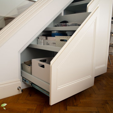 Living room under stairs storage