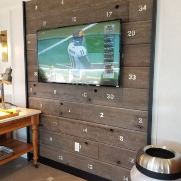 Accent wall made from Notre Dame stadium Bench seat redwood boards