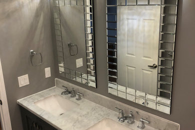 Large elegant 3/4 bathroom photo in Ottawa with black cabinets, gray walls, an undermount sink, granite countertops and gray countertops
