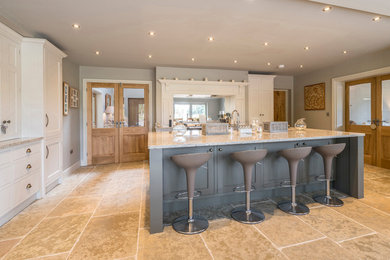 This is an example of a transitional kitchen in Manchester.