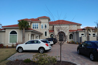 Example of a tuscan home design design in Charleston