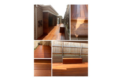 Example of a large trendy backyard deck design in Melbourne