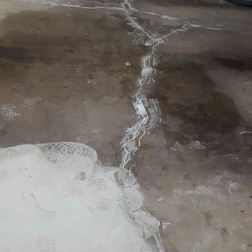 Oil, Cracks, Uneven Floor, Cold Weather, Unhappy Client