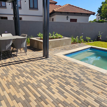 Midfield new garden, pool, paving and pergola