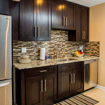 Contemporary Espresso Kitchen Remodel with Granite Counters & Mosaic Backsplash