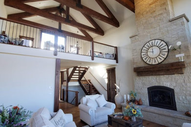 Mid-sized mountain style formal and open concept dark wood floor and brown floor living room photo in Denver with beige walls, a standard fireplace, a stone fireplace and no tv