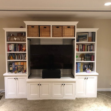 Front view of retracted projector screen assembly