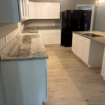 Granite kitchen countertops with island overhang
