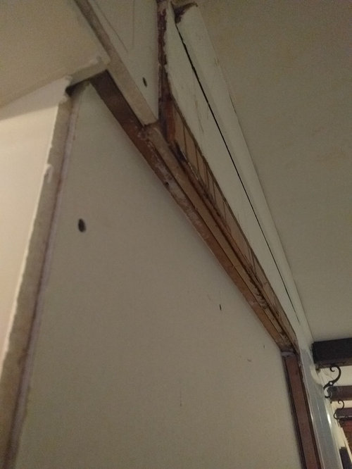 How to line up drywall with wood paneling?