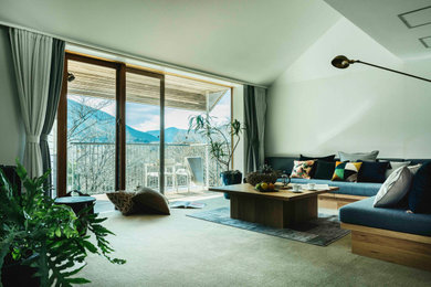 Inspiration for a contemporary open concept carpeted, gray floor and vaulted ceiling living room remodel in Tokyo with white walls