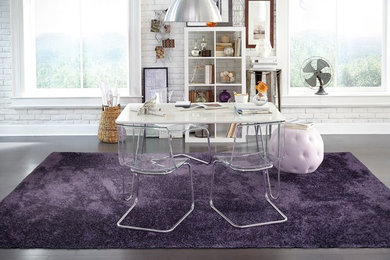 Large trendy freestanding desk vinyl floor study room photo in Orange County with white walls