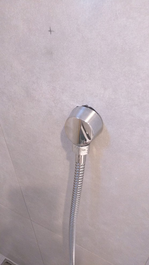 Shower drop ell tile hole too big