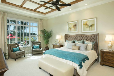 Bedroom - mid-sized coastal master carpeted bedroom idea in Orlando with beige walls and no fireplace